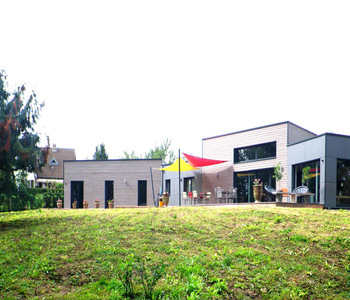 Construction maison individuelle moderne en ossature bois